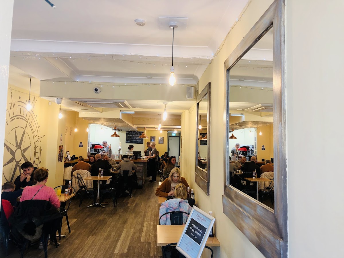 Guests inside Compass Cafe Bar